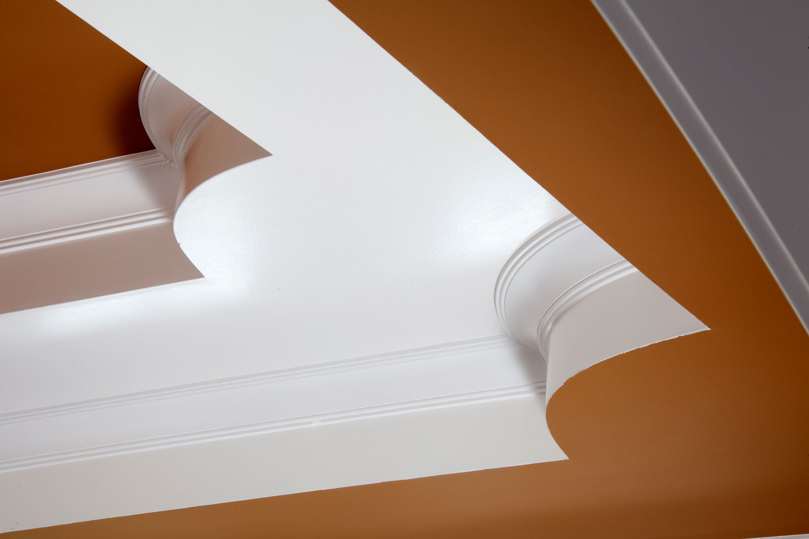 Painted stair trim and curved molding in a Gale custom home